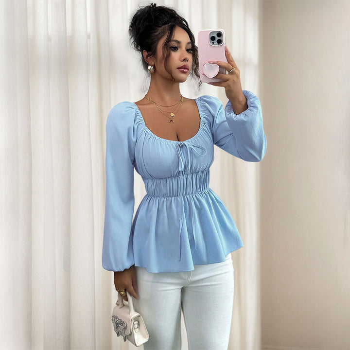 Blouse décontractée pour femmes avec insert à la taille et manches volumineuses Chic & Stil