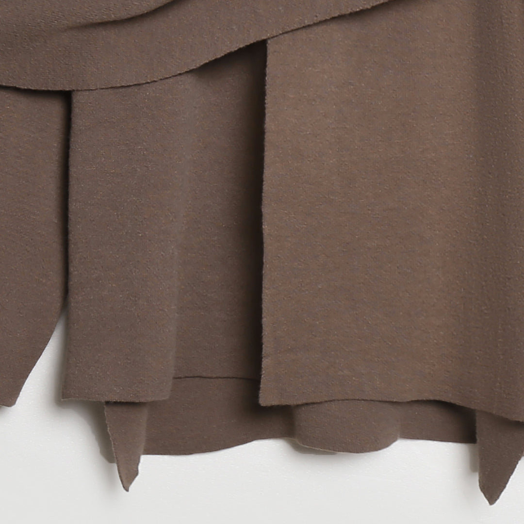 Ladies comfortable knitted poncho with refined drapes Lune London