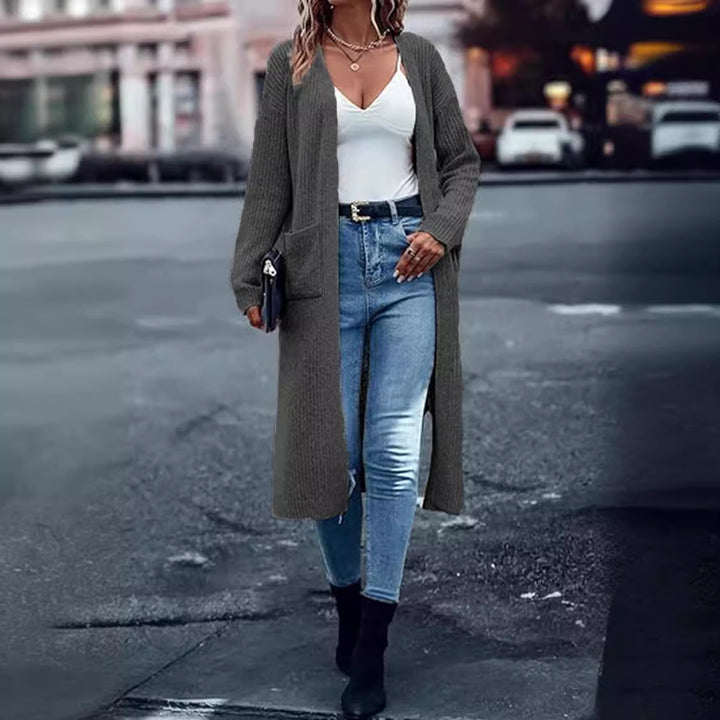 Long knit coat for women with structured design and practical pockets Lune London