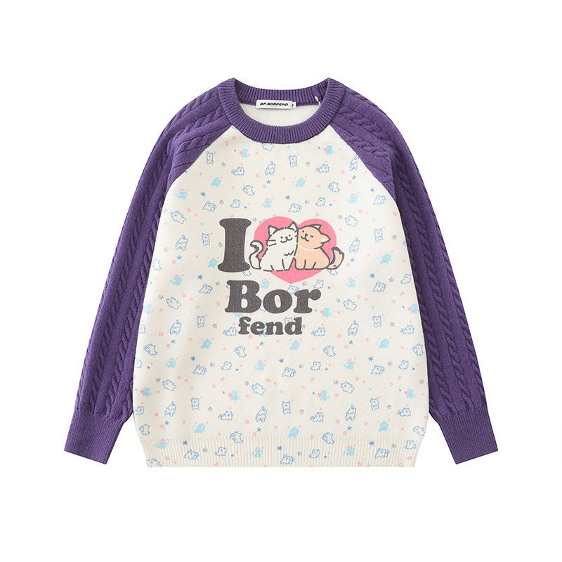 Women's knitted sweater with raglan sleeves, cable pattern sleeves and cartoon cat front print Amarae
