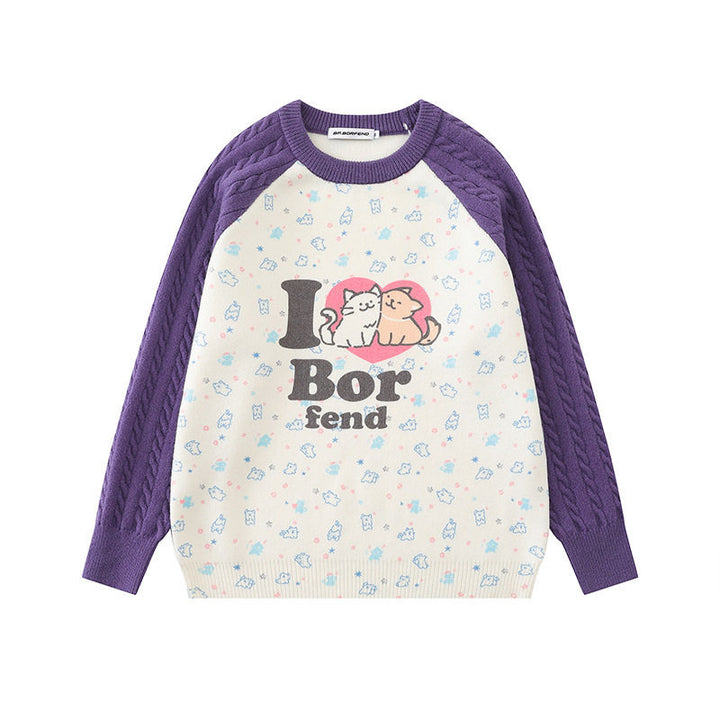 Women's knitted sweater with raglan sleeves, cable pattern sleeves and cartoon cat front print Amarae