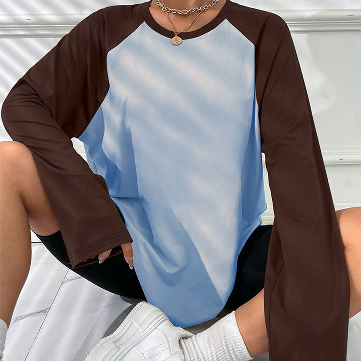 T-shirt à manches longues pour femmes avec coupe raglan sportif et design color block tendance Chic & Stil