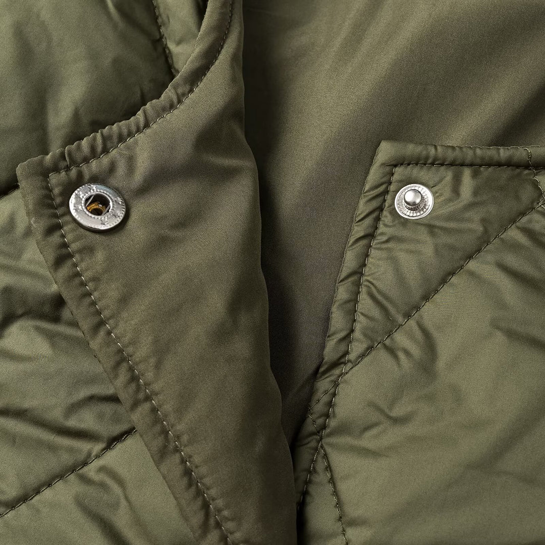Women's quilted jacket without collar with snap button closure and patch pockets Amarae