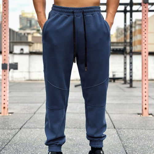 Men's sporty jogging pants with elastic waistband and practical side pockets Amarae