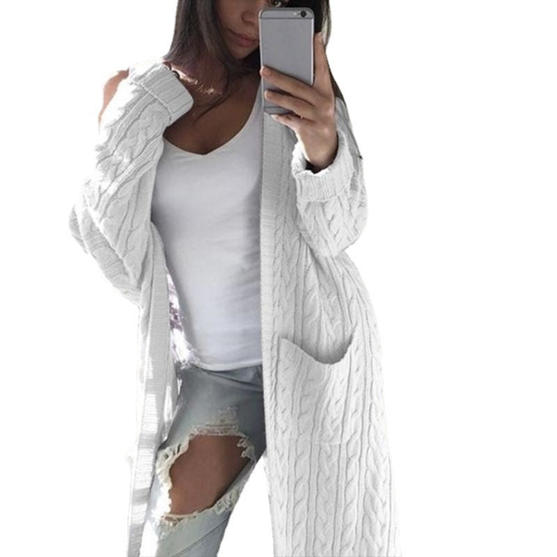 Women's knitted coat with patterns and practical pockets in an open cut Amarae