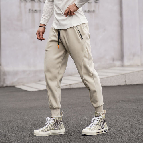 Sporty jogger pants for men with elastic waistband and stylish contrasting stripes Amarae
