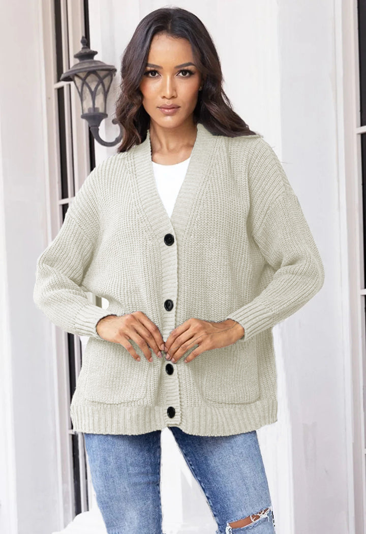 Ladies chunky knit cardigan with large pockets and modern button design Chic and Still