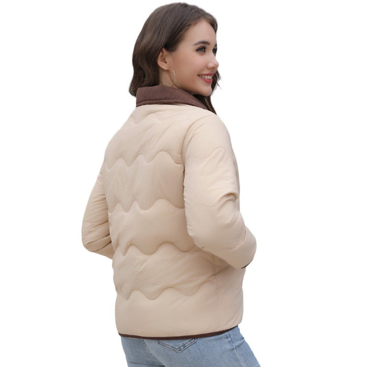 Women's quilted jacket with elegant collar and structured surface