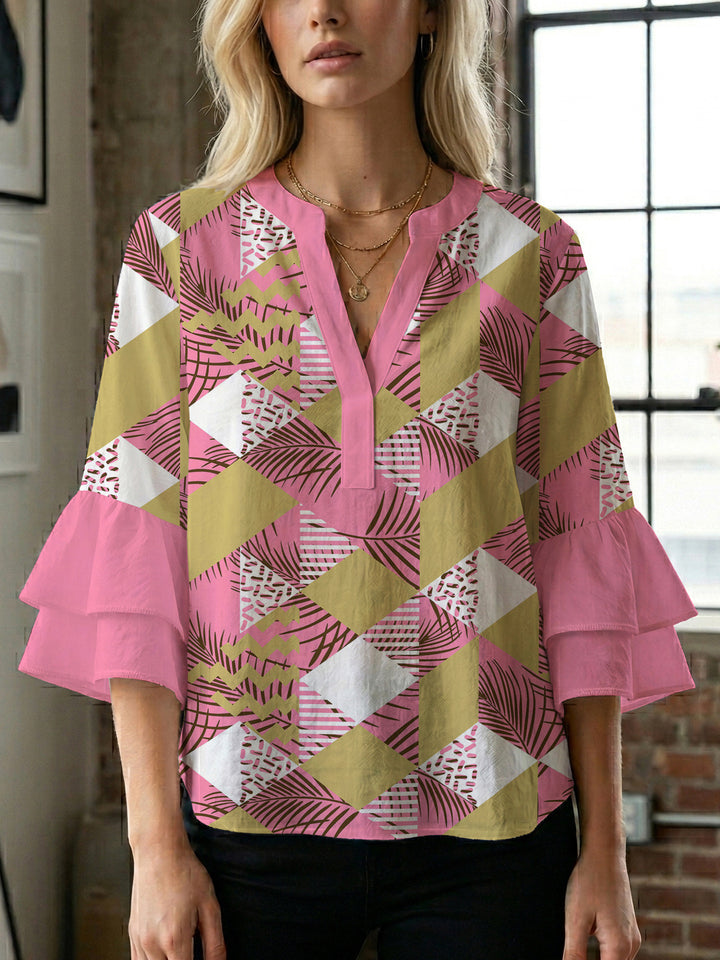 Women's blouse with voluminous wing sleeves and intense leaf pattern Lune London