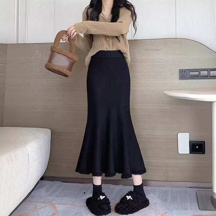 Elegant maxi skirt for women with voluminous hem and fringed details Lune London