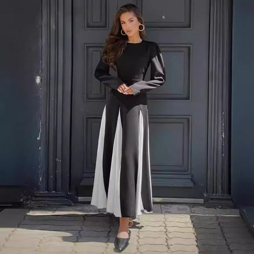 Elegant long dresses for women with puff sleeves and a flowing hem Amarae