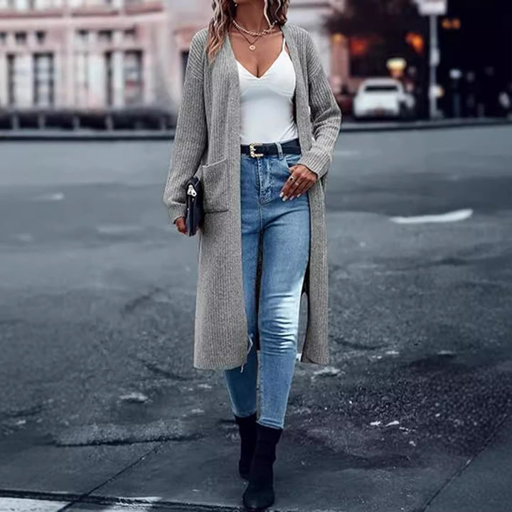 Knitted coat for women with open front parts and practical pockets Lune Londonl