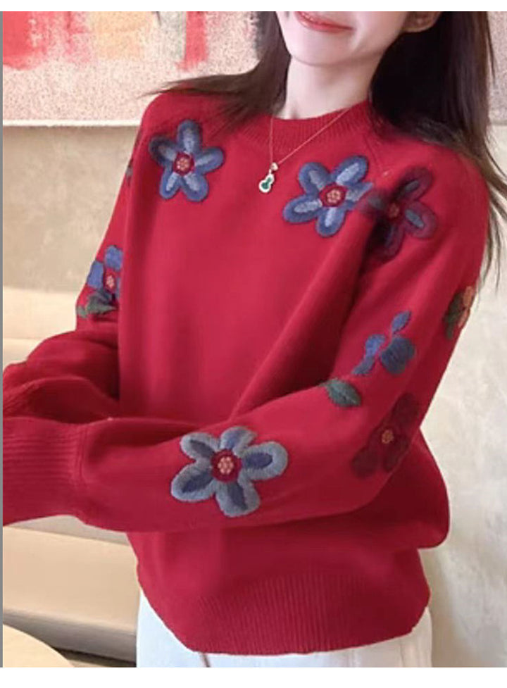 Pull féminin tendance avec design brodé floral Chic & Stil