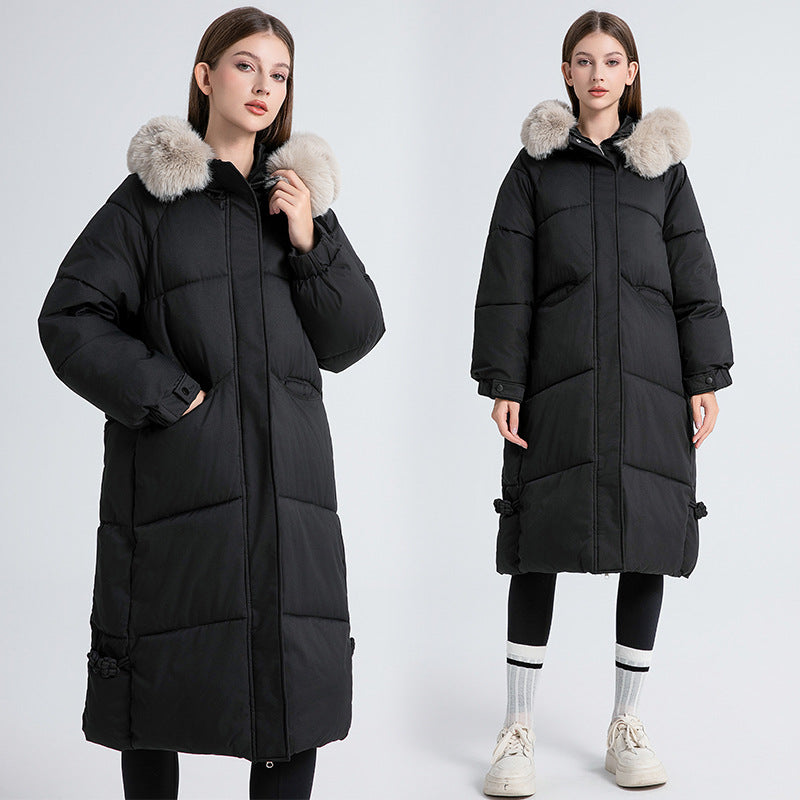 Long winter coat for women lined with removable faux fur collar and practical drawstrings Lune London
