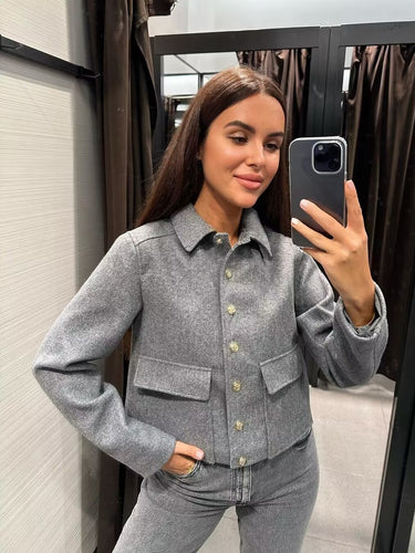 Short trendy jacket for ladies with practical pockets and gold buttons Amarae
