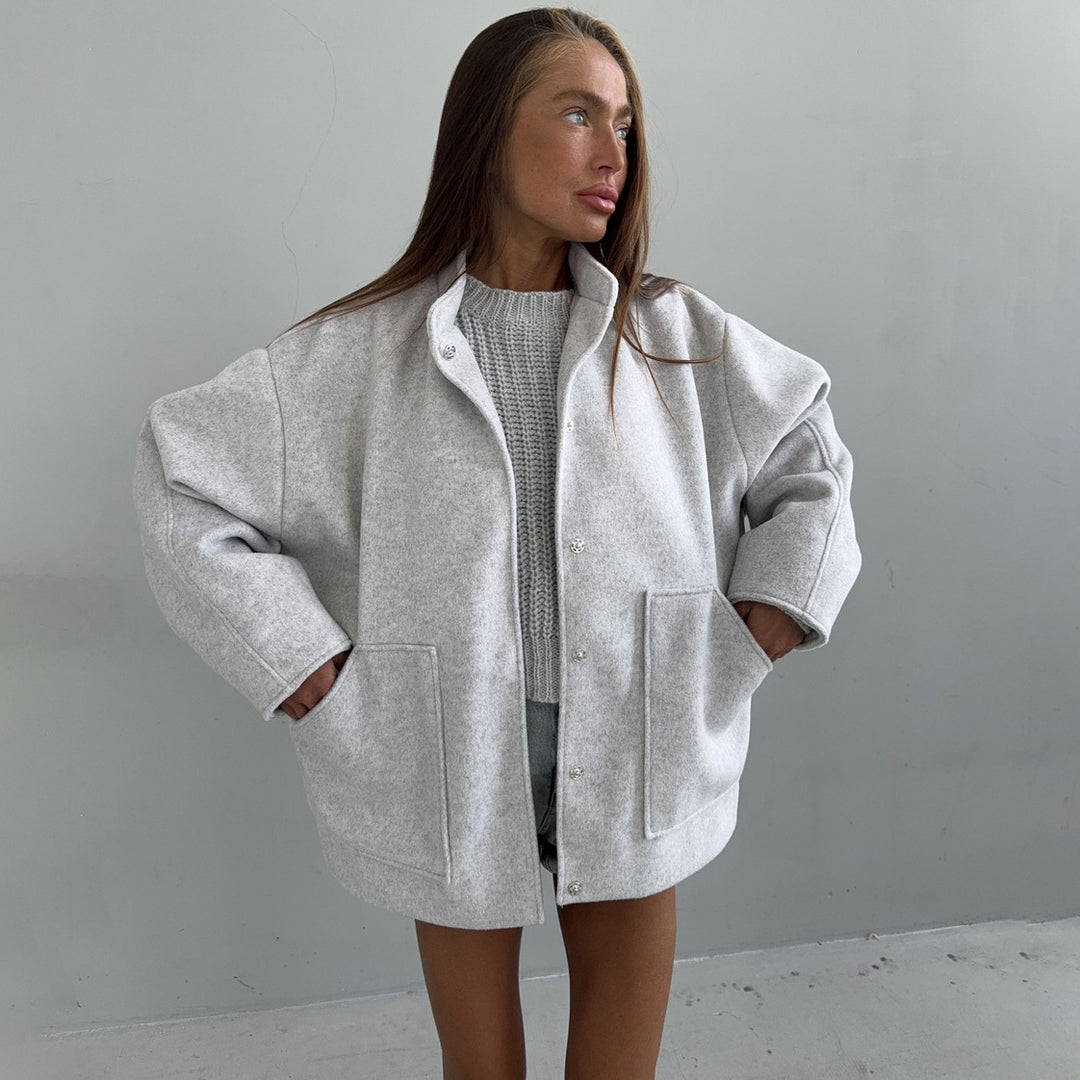 Oversized wool coat for women with simple button details and practical pockets Lune London