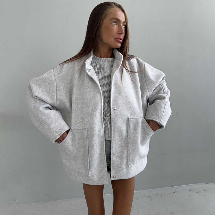 Oversized wool coat for women with simple button details and practical pockets Lune London
