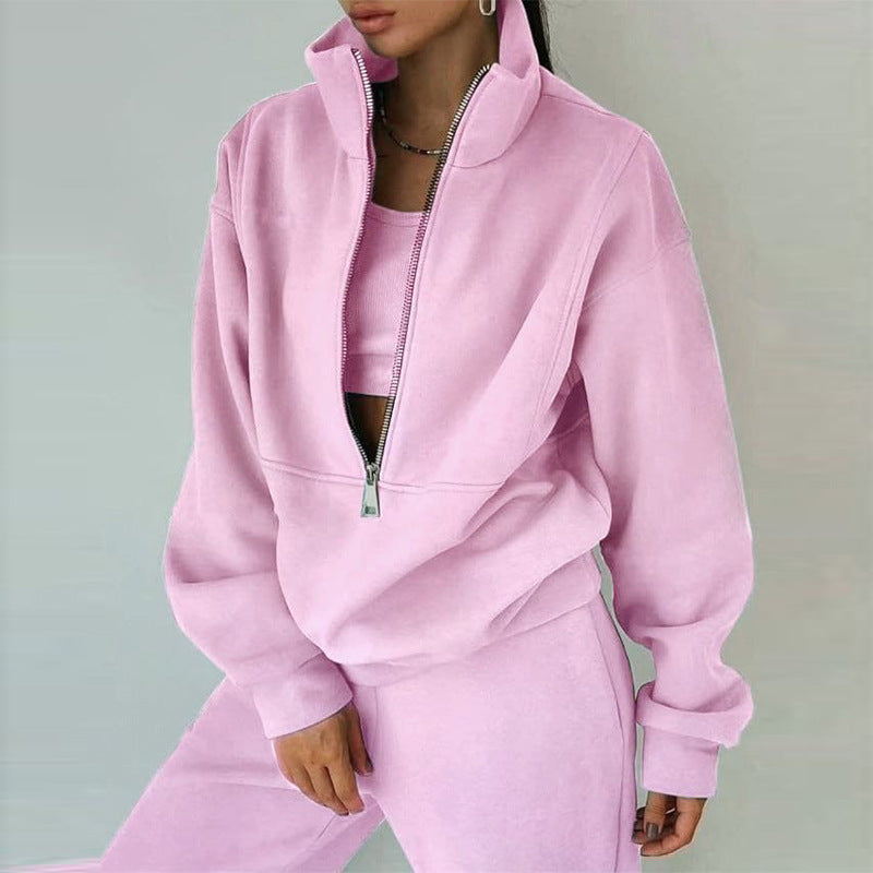 Women's sporty sweatshirt with high collar and practical zipper Chic & Stil