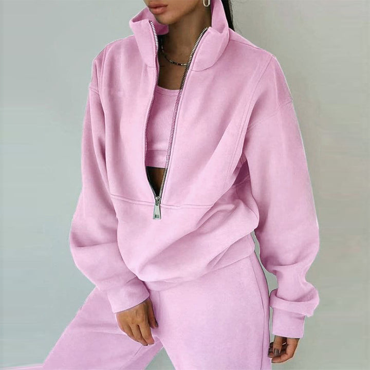 Women's sporty sweatshirt with high collar and practical zipper Chic & Stil