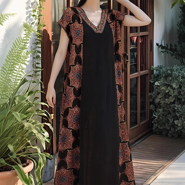 Maxi dress for women with elaborate embroidery details and a flowy fit Lune London