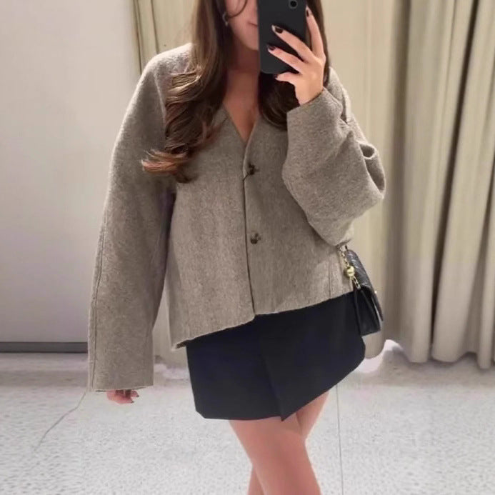 Modern women oversized jacket with elegant button closure treatment Lune London