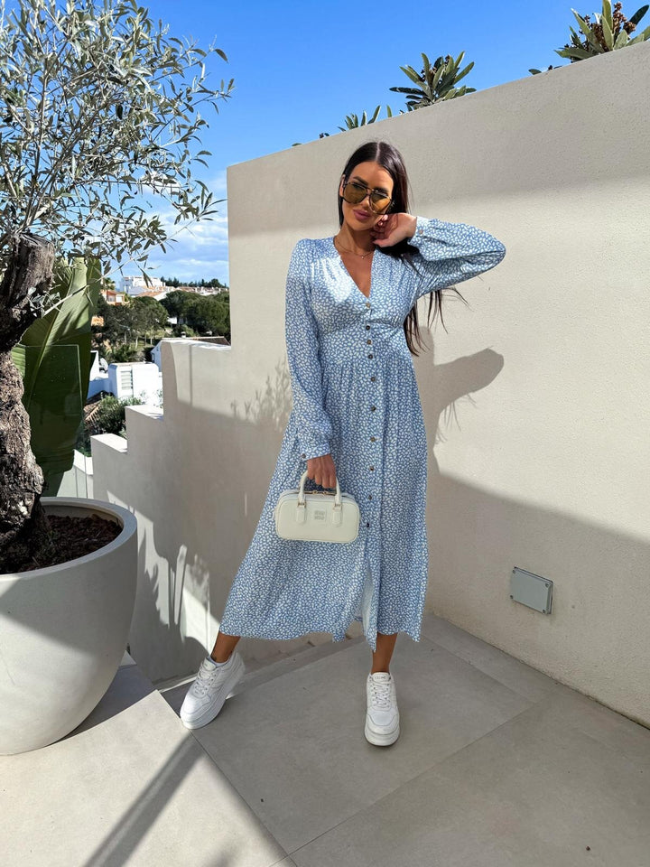 Elegant maxi dresses for women with floral patterns and button details Lune London
