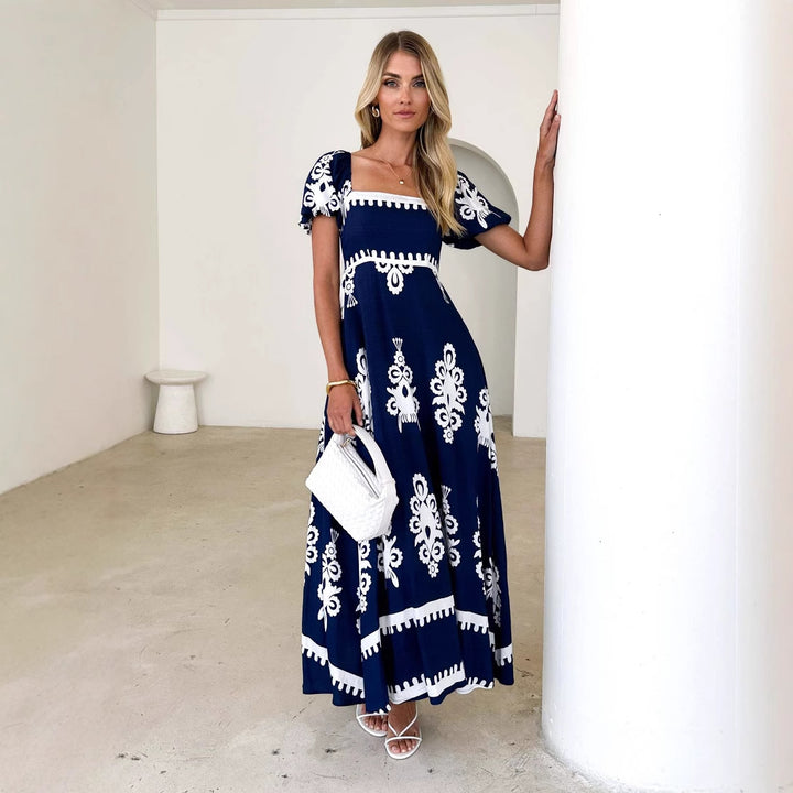Women's maxi dress with elegant ruffle details and floral pattern Lune London