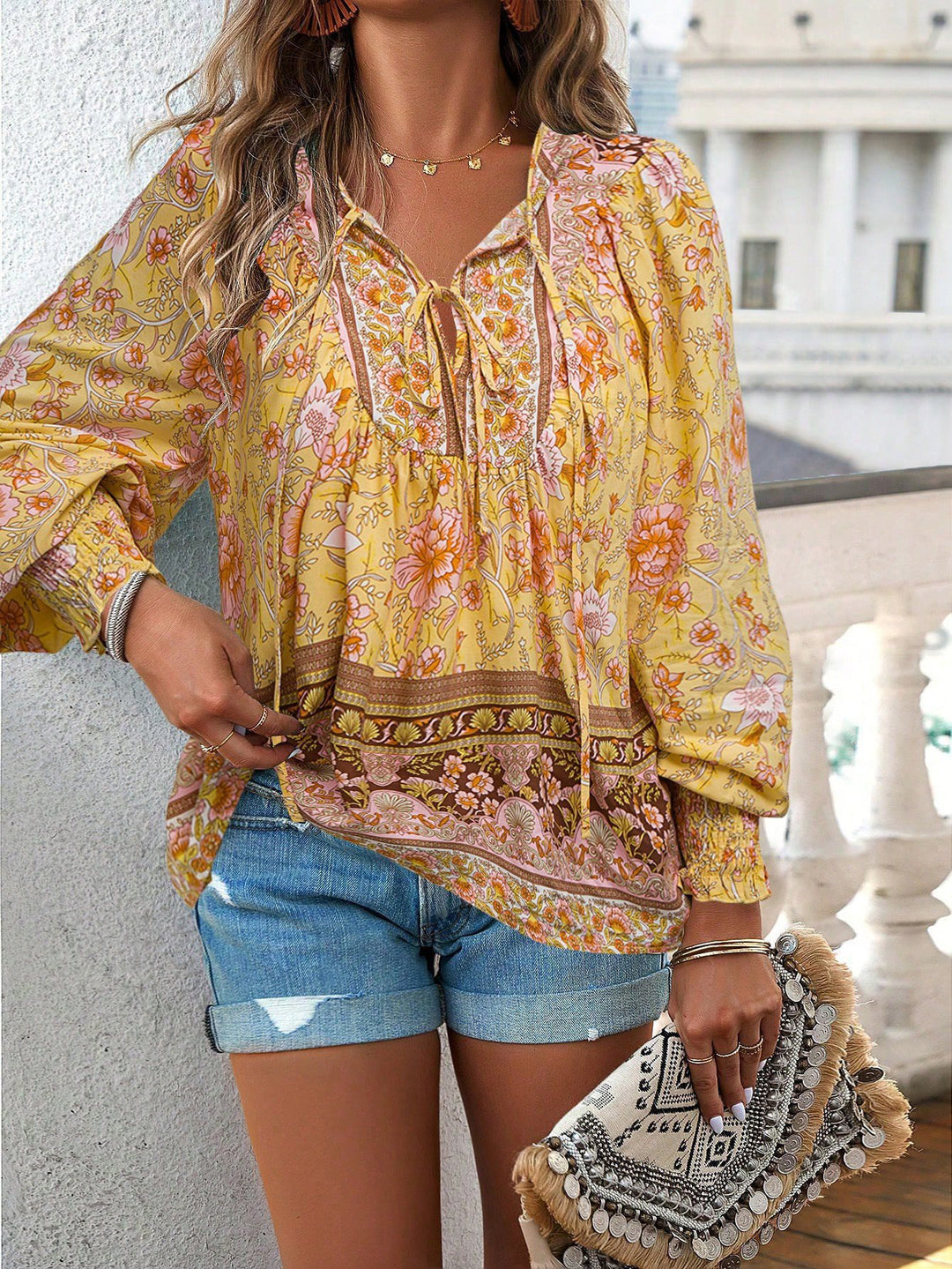 Lightweight women's blouse with a refined floral design and a relaxed fit Lune London