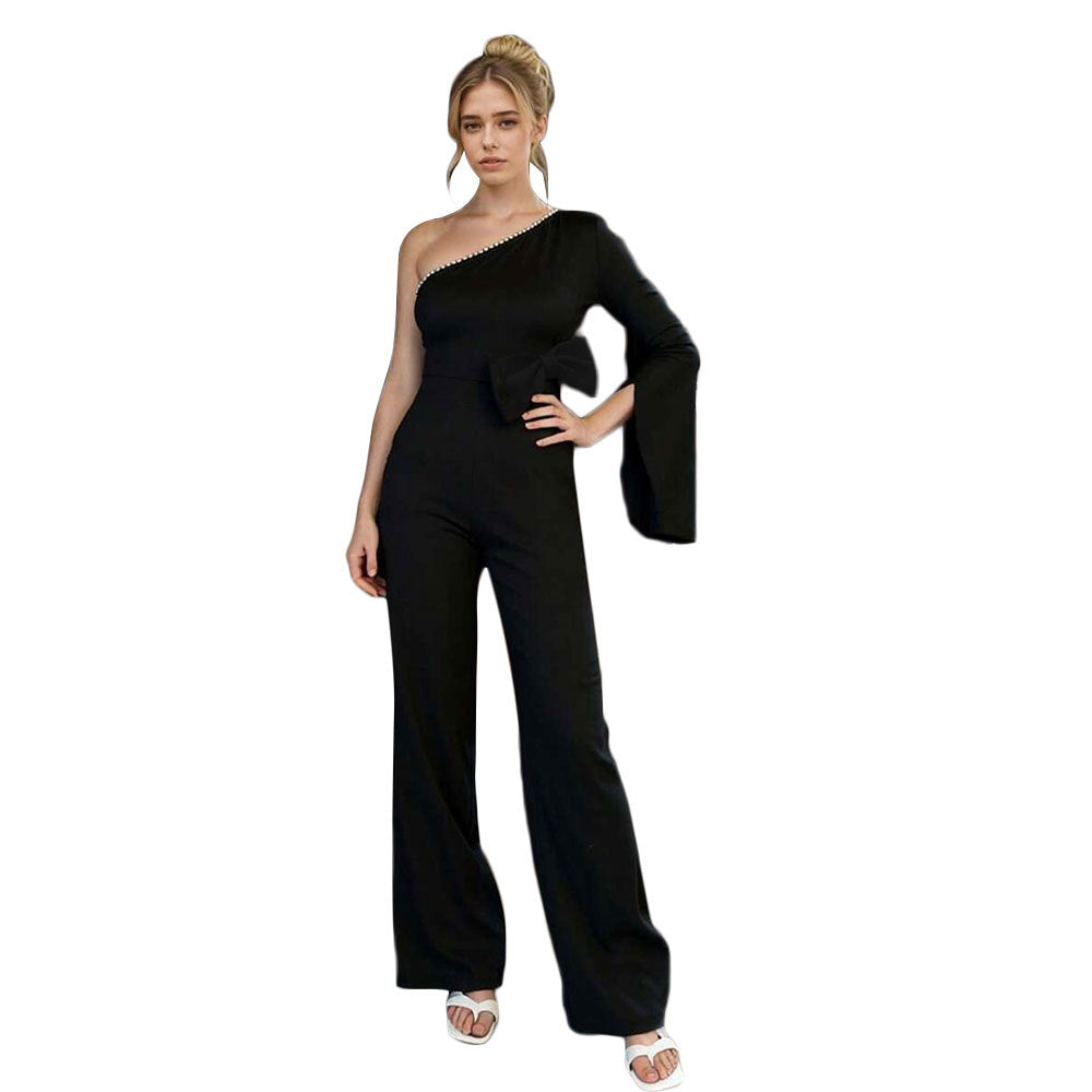 Combinaison femme avec design asymétrique et appliqué nœud élégant Chic & Stil