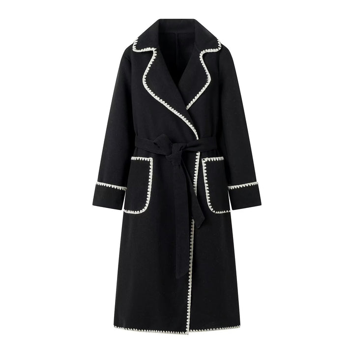 Elegant long coat for women with a tie belt and contrasting piping Lune London