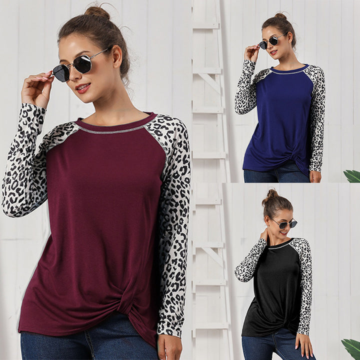 Loose blouse with long sleeves for women with leopard sleeves and bow detail Lune London