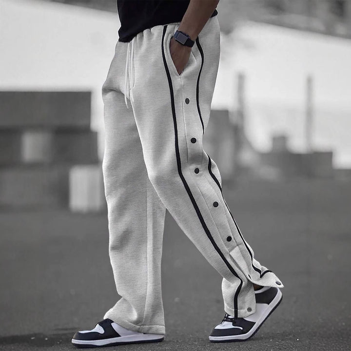 Stylish men's sports pants with snap button details and side pockets Lune London
