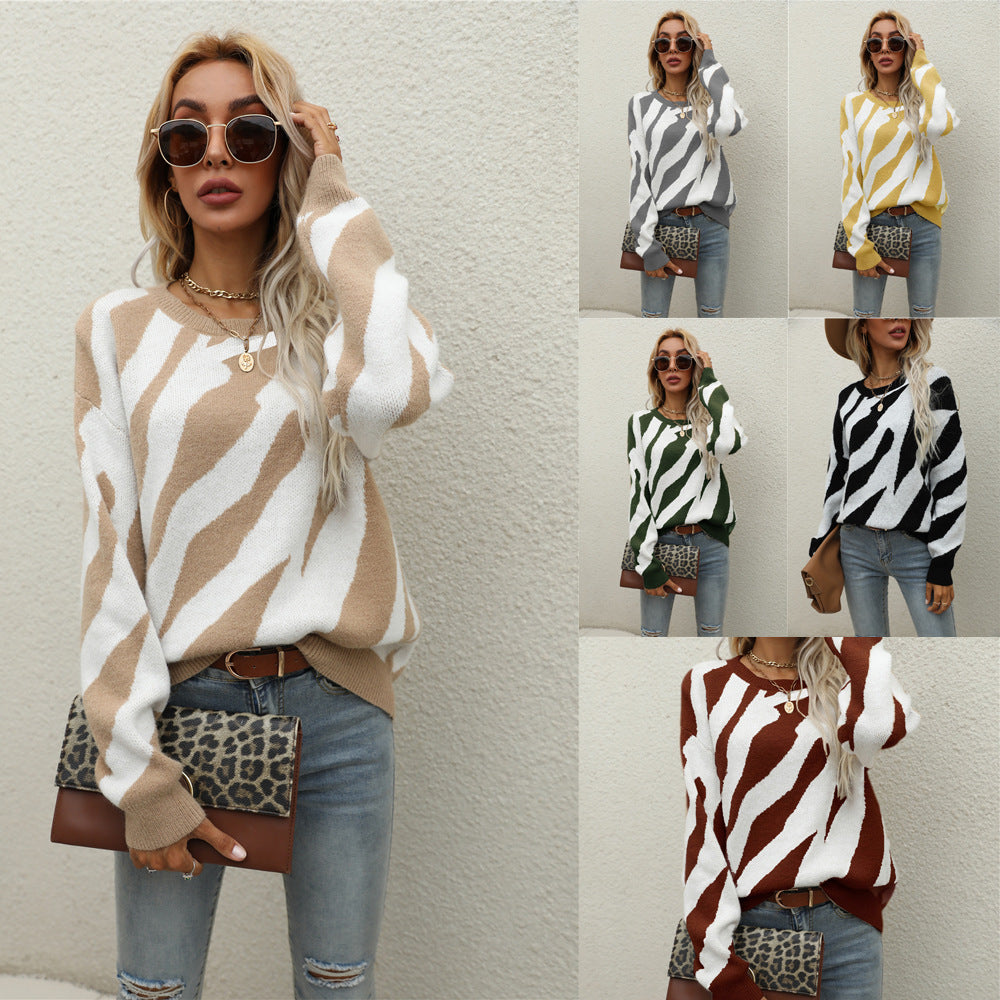 Pull tricoté élégant pour femmes avec un motif animal frappant et une coupe innovante Chic & Stil