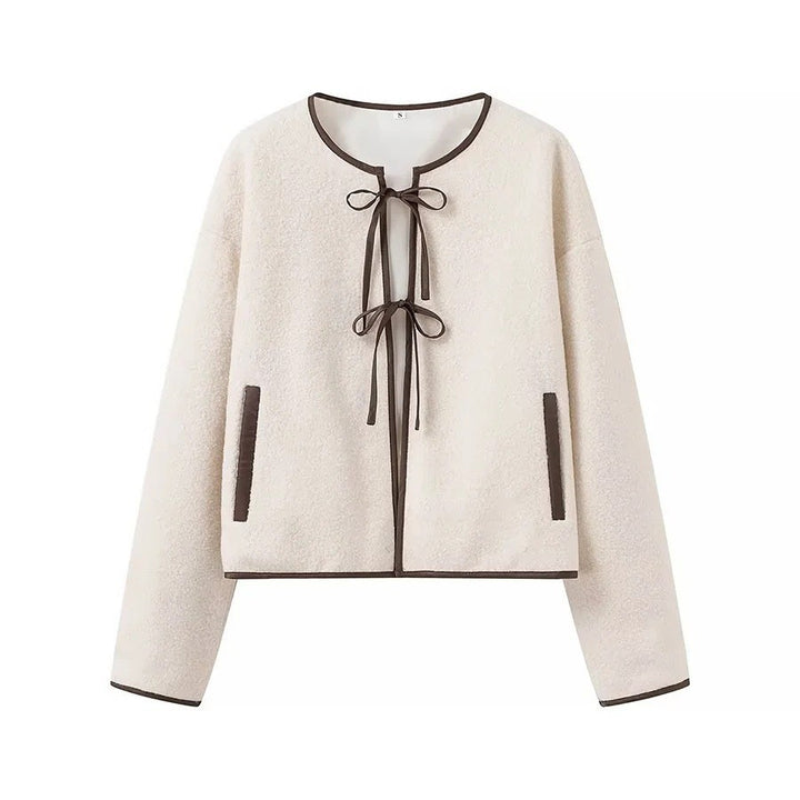 Women's short jacket in teddy look with decorative ribbons and contrasting piping Amarae