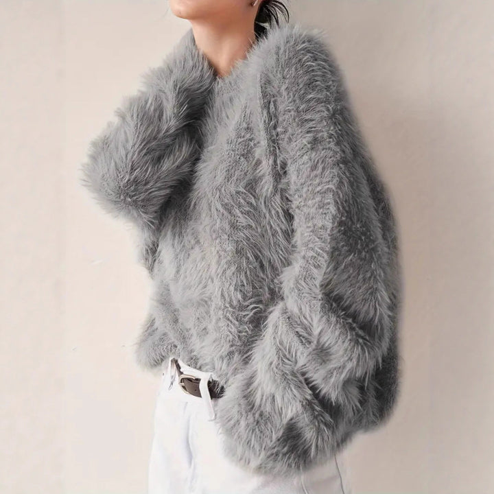 Ladies soft sweater with soft material and chic trendy design