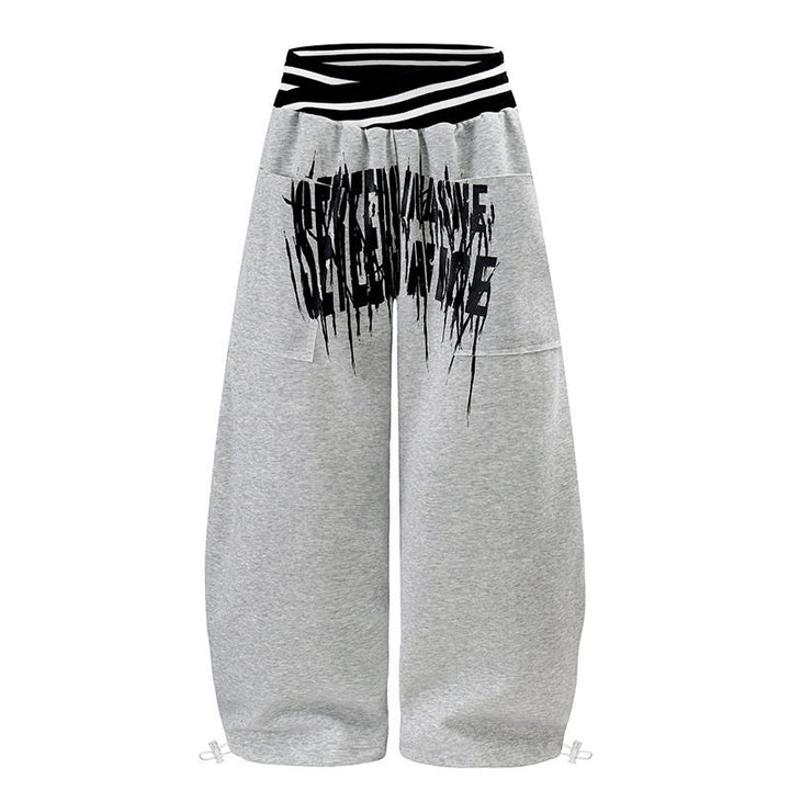 ladies culotte jogging pants with high-contrast waistband, patch pockets, and drawstring hem.