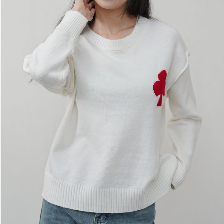 Pull court à motif pour femmes en matière tricot doux avec logo emblématique Chic & Stil