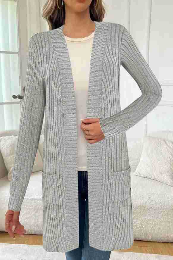 Long knitted jacket for women with side pockets and textured design Lune London