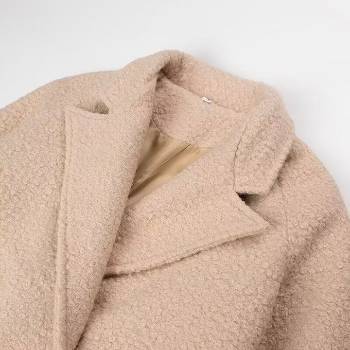Elegant wool coat for women with tie belt and stylish button details Lune London