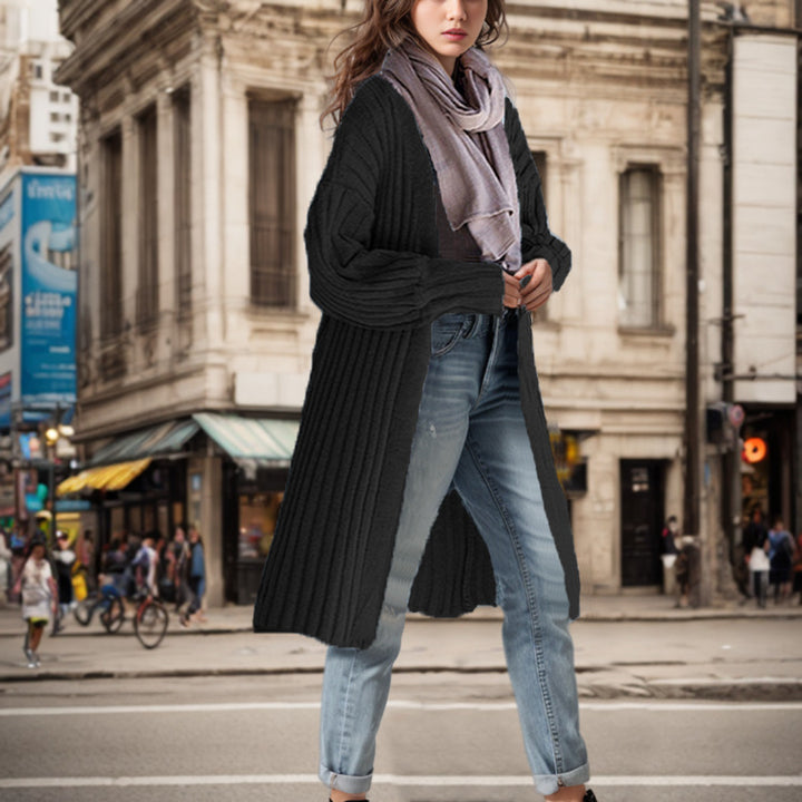 Long knit coat for women with a relaxed cut, deep pockets, and soft touch Lune London