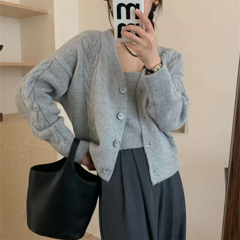 Cardigan pour femmes en maille torsadée avec patte de boutonnage et coupe élégante Chic & Stil