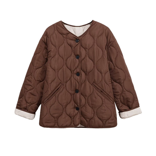 Veste matelassée pour femmes avec détails de boutons modernes Chic & Stil