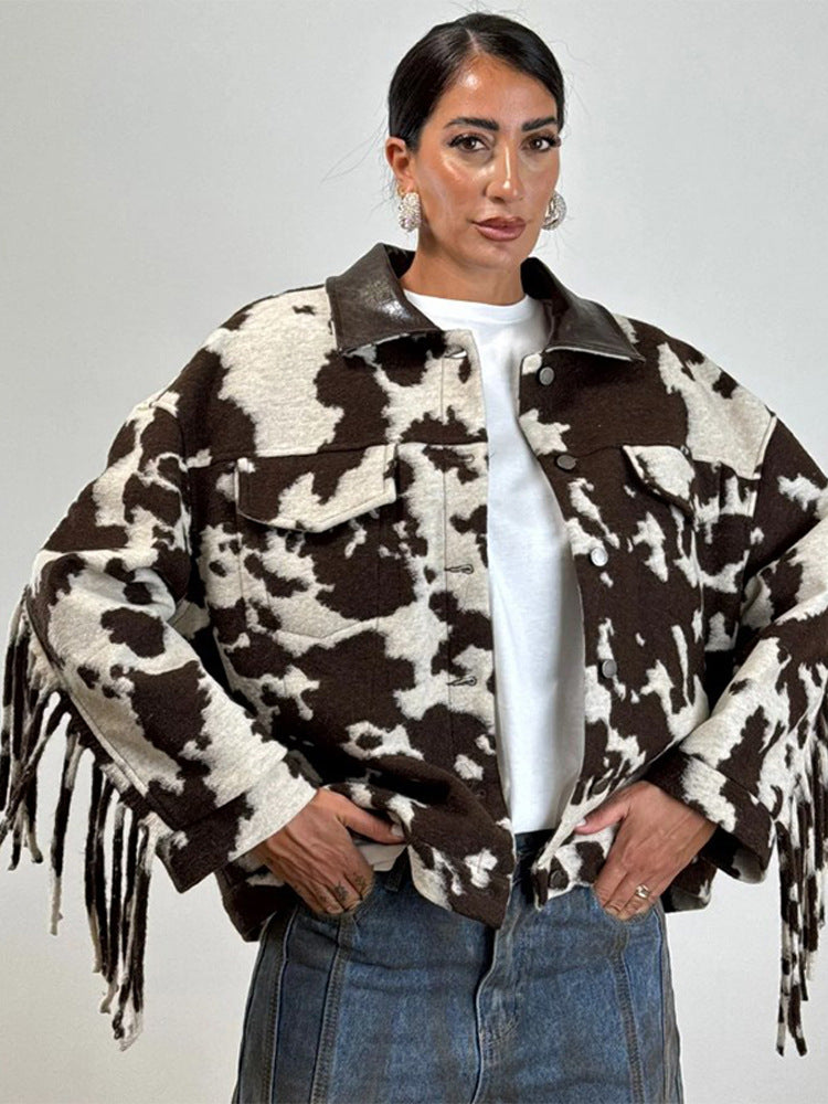 Ladies short jacket in cow print with fringes, faux fur look and leather collar Amarae