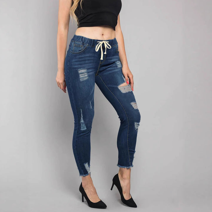 Women High-Waisted Destroyed Jogger Jeans with Elastic Drawstring Waistband and Cropped Frayed Hem Amarae