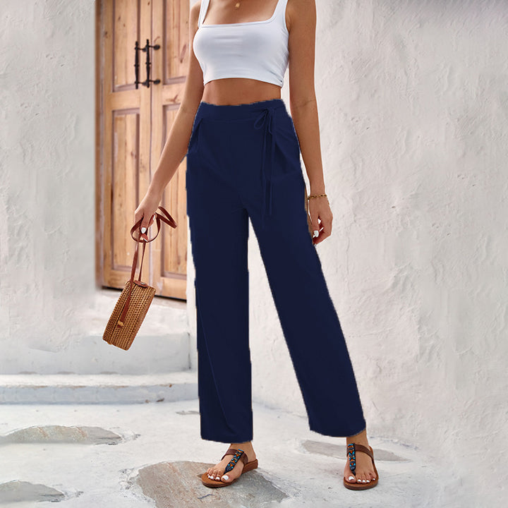 Loose summer pants for women with elastic waistband and tie belt Lune London