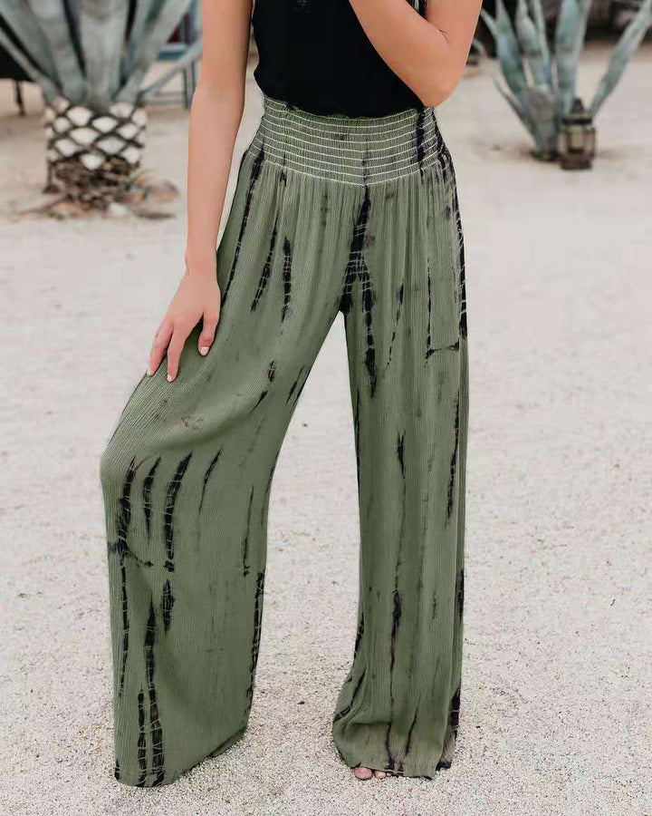 Loose leisure pants for women with elastic waist and striped pattern Lune London