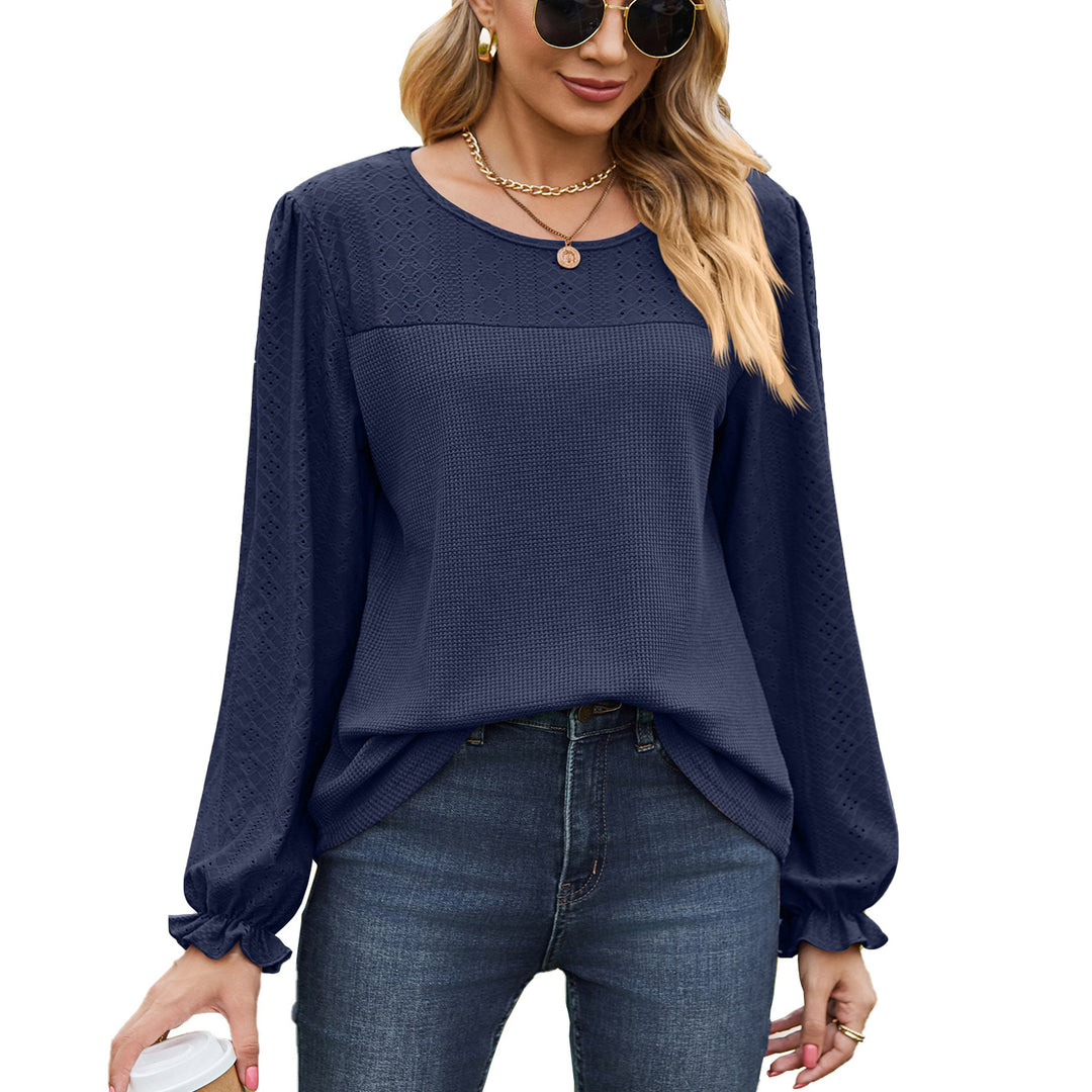 Women's top with textured design and elegant puff sleeves Amarae