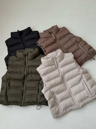 Ladies quilted gilet with adjustable drawstring waist and practical pockets Amarae