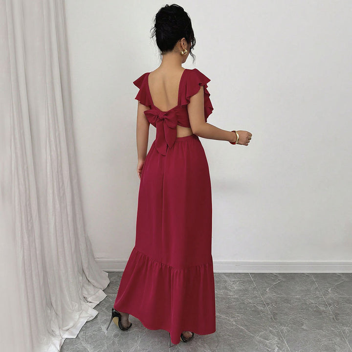 Robe maxi femme avec des détails de volants volumineux et une découpe sophistiquée dans le dos Chic & Stil