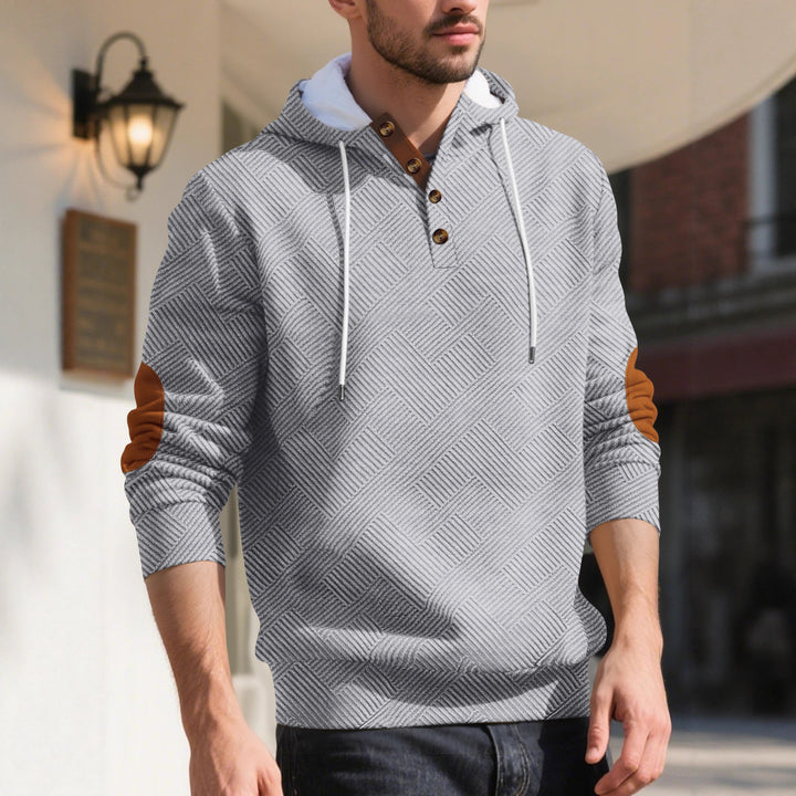 Trendy hooded sweater for men in textured material with chic and stylish accents